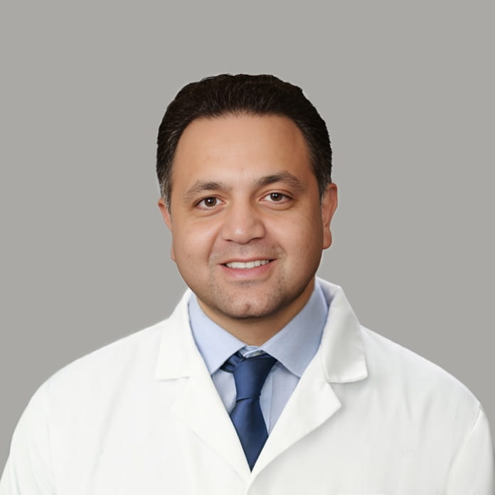 Hamid-Feiz-Lab-coat-696x696 (1) image of Paul Skomra, MD
